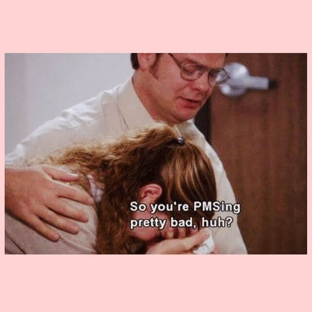 A scene from the office with Pam crying and Dwight telling her shes PMSing pretty bad